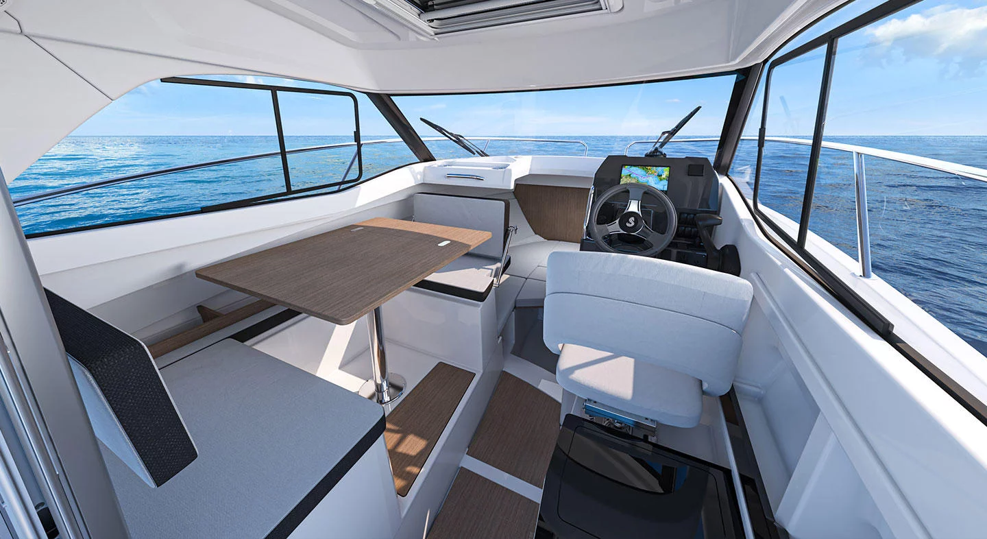 Vaartlander_BeneteauAntares7-17 Zithoek en stuurpositie in cabine van Beneteau Antares 7