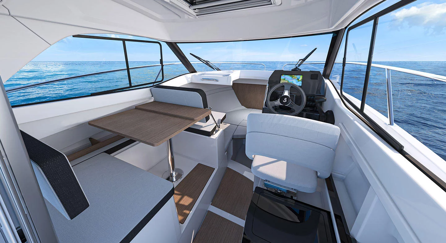 Vaartlander_BeneteauAntares7-18 Eettafel en stuurpositie aan boord van Beneteau Antares 7