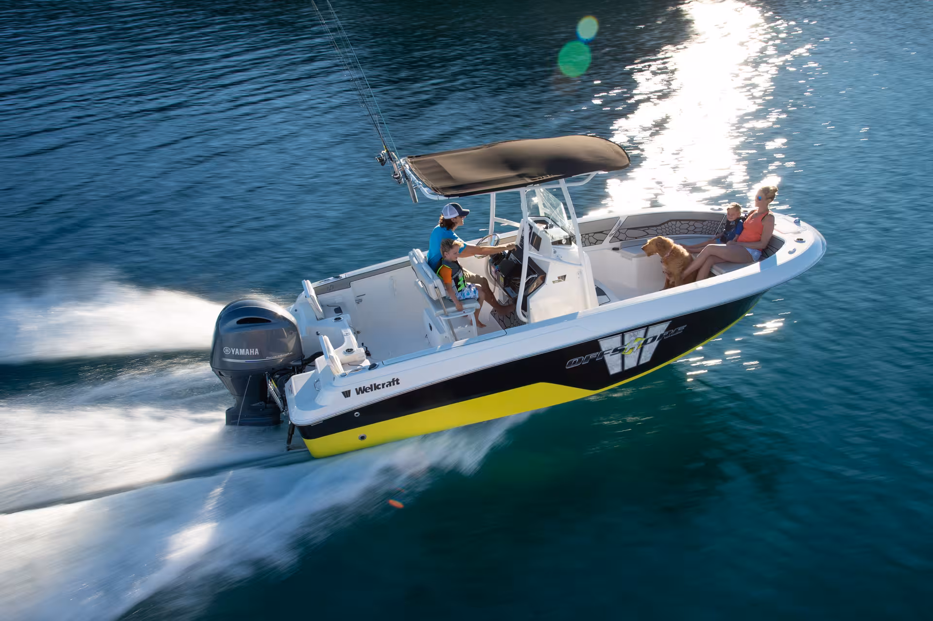 Vaartlander_Wellcraft202Fisherman-43 Wellcraft 202 Fisherman console boot varend op helder water met T-top