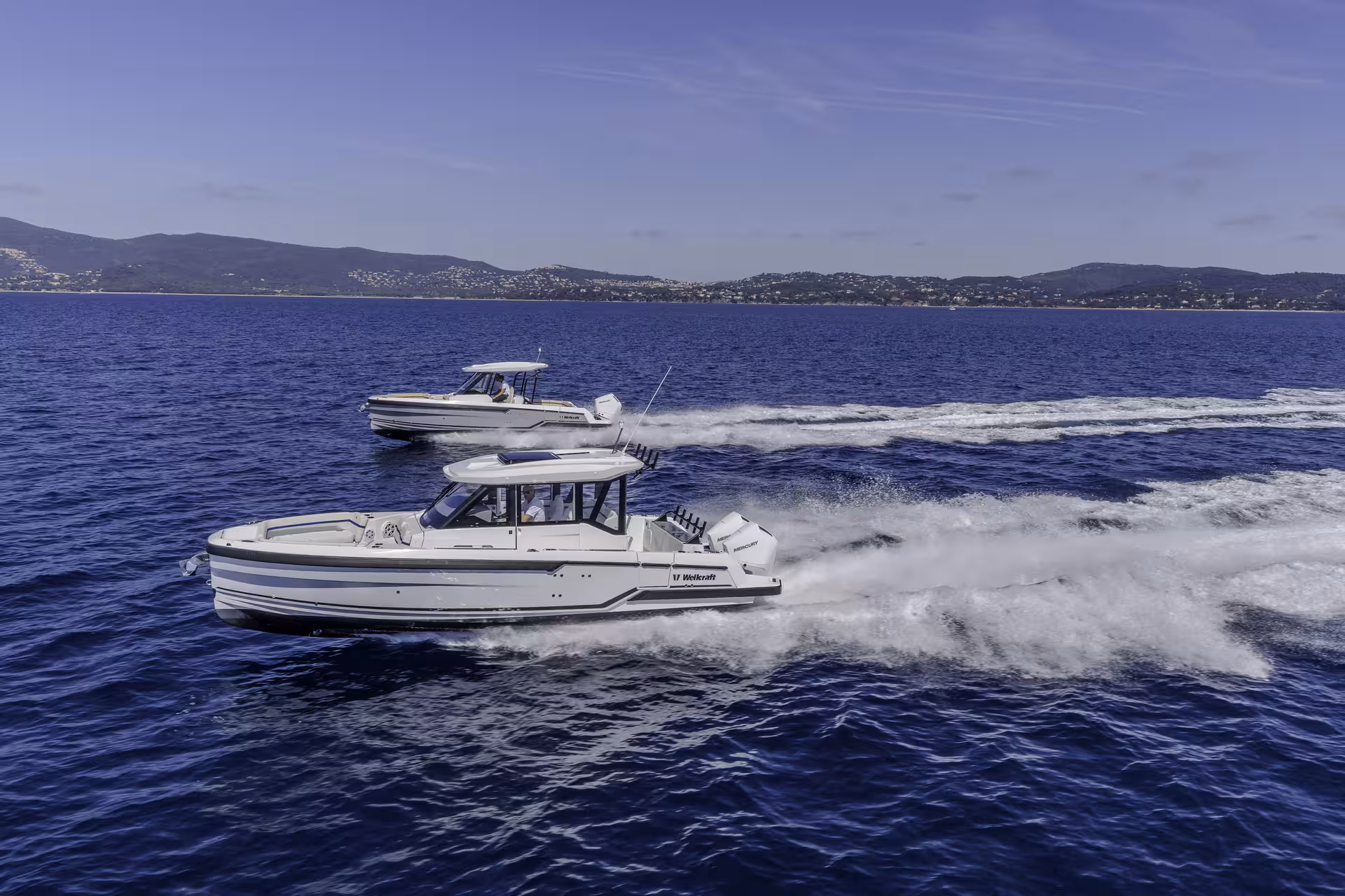 Vaartlander_Wellcraft28Explorer-30 Wellcraft 28 Explorer console boot varend op open water met snelheid
