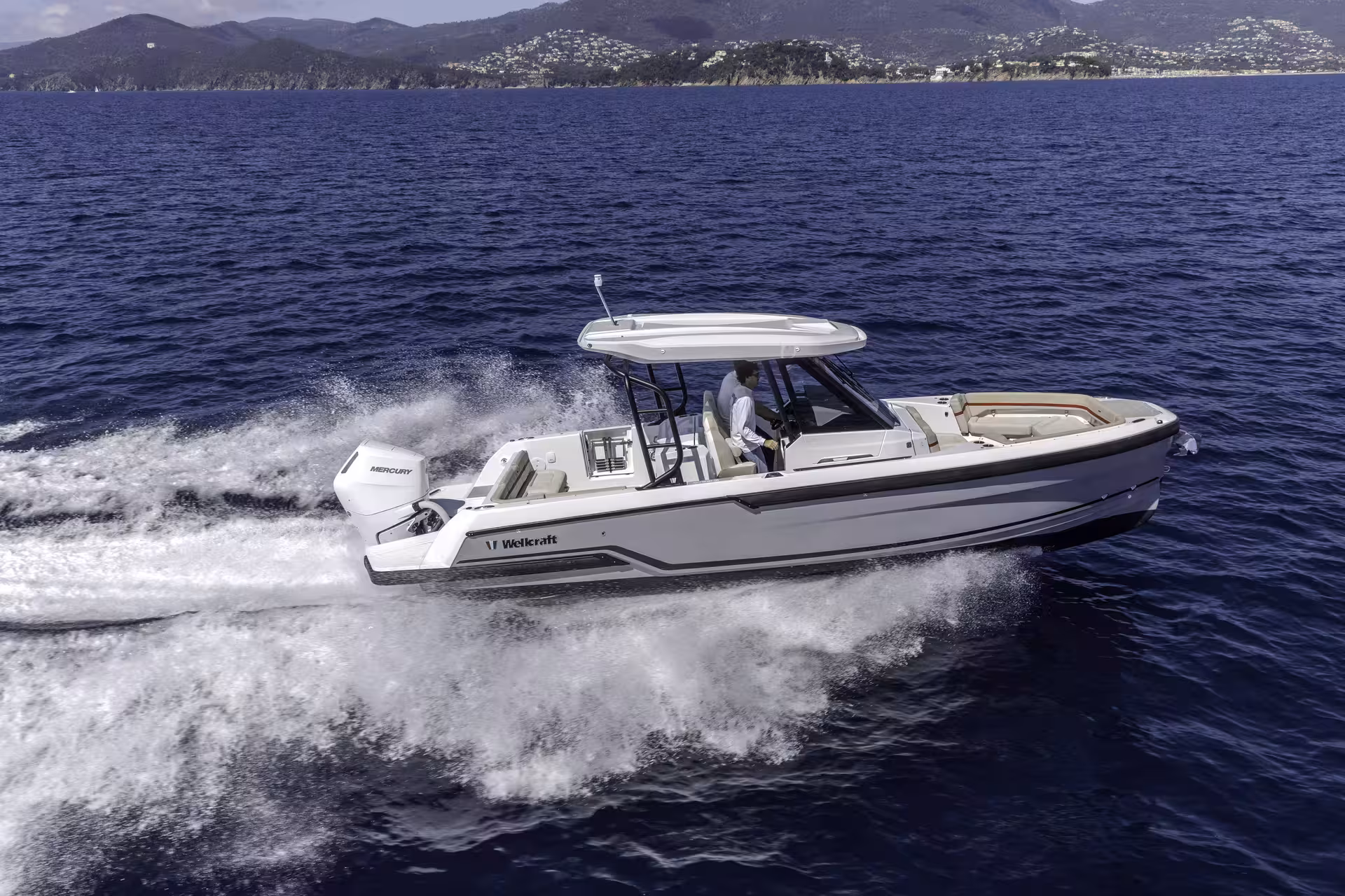 Vaartlander_Wellcraft28T-Top-4 Wellcraft 28 T-Top console boot varend op open water met sportieve prestaties