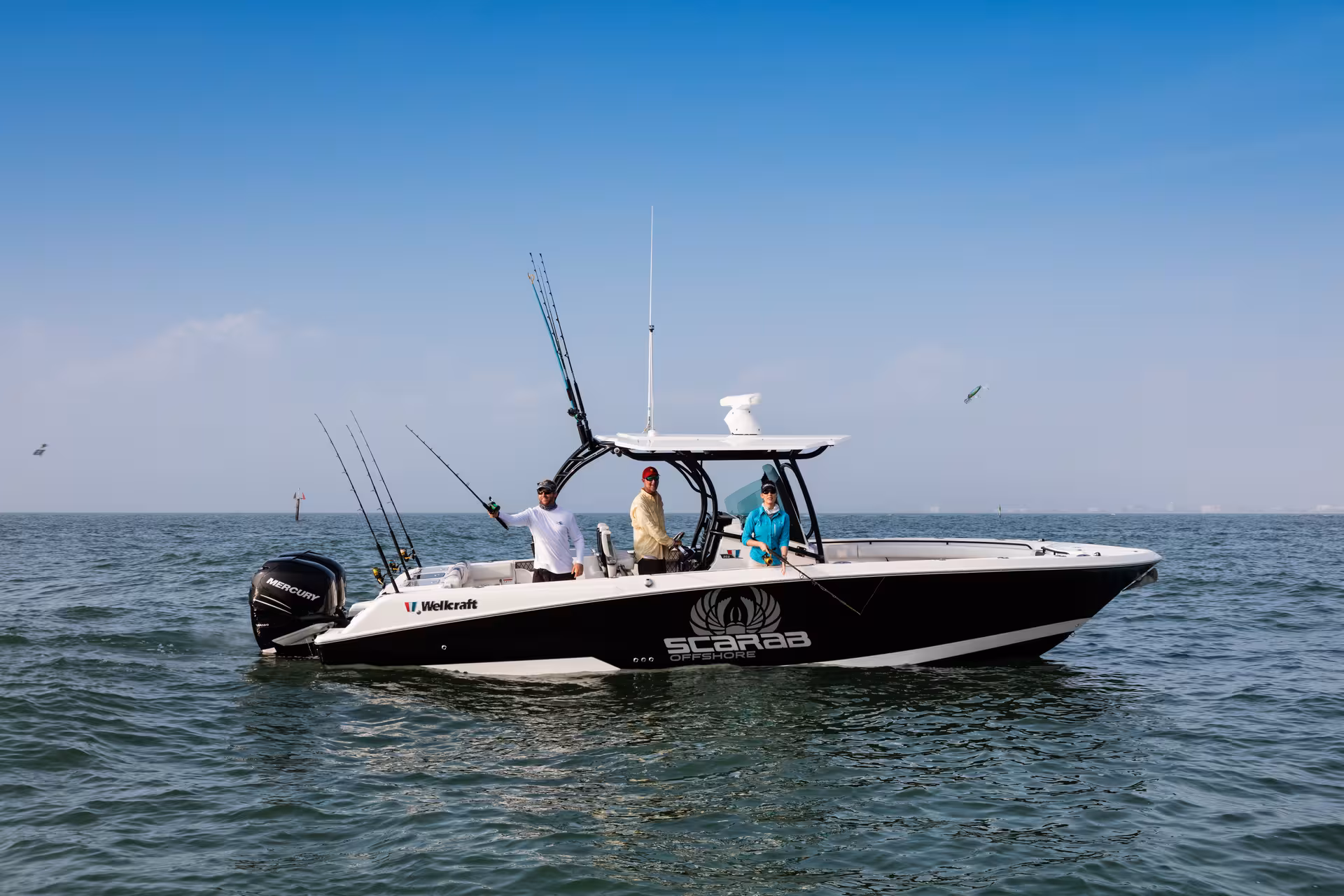 Vaartlander_Wellcraft302Fisherman-11 Wellcraft 302 Fisherman visboot met hengelhouders en open dek op rustig water