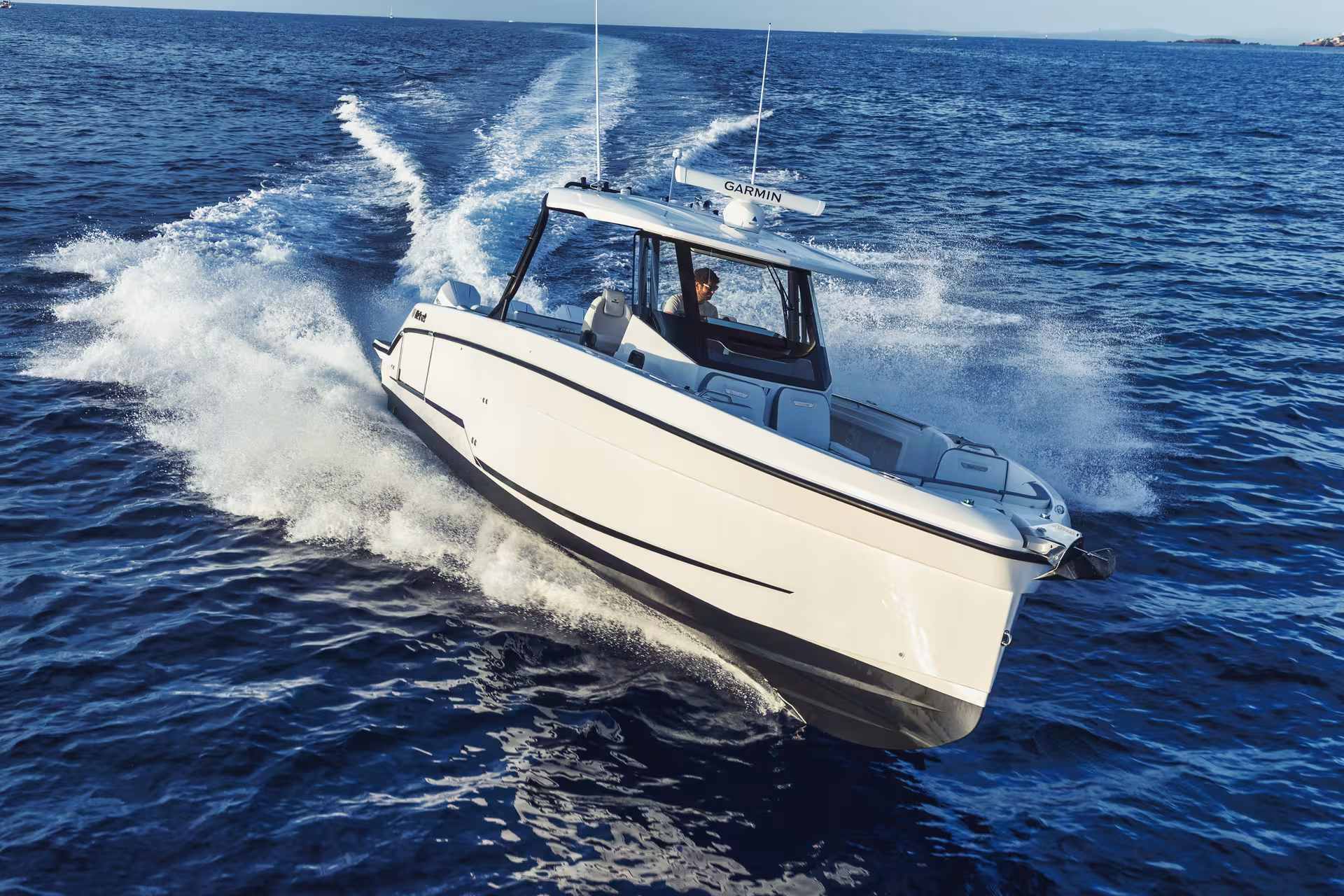 Vaartlander_Wellcraft38T-Top-3 Wellcraft 38 T-Top op snelheid met diepe V-romp voor stabiel varen op zee